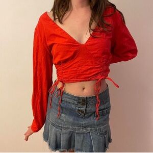 orange v-neck long sleeve tie side top